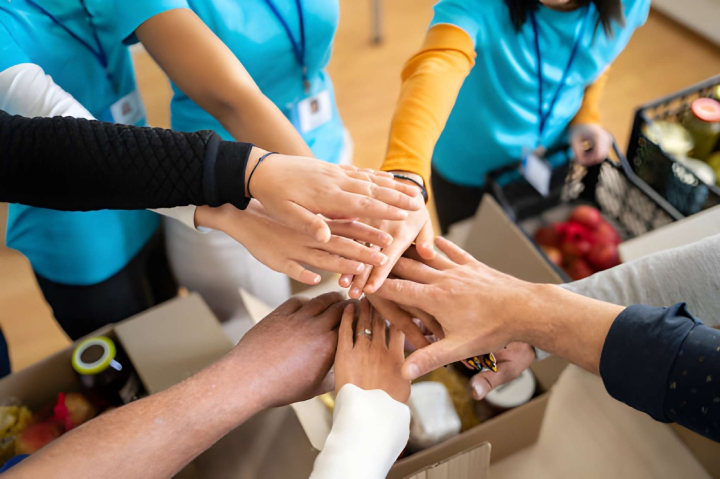 Volunteers supporting a community programme